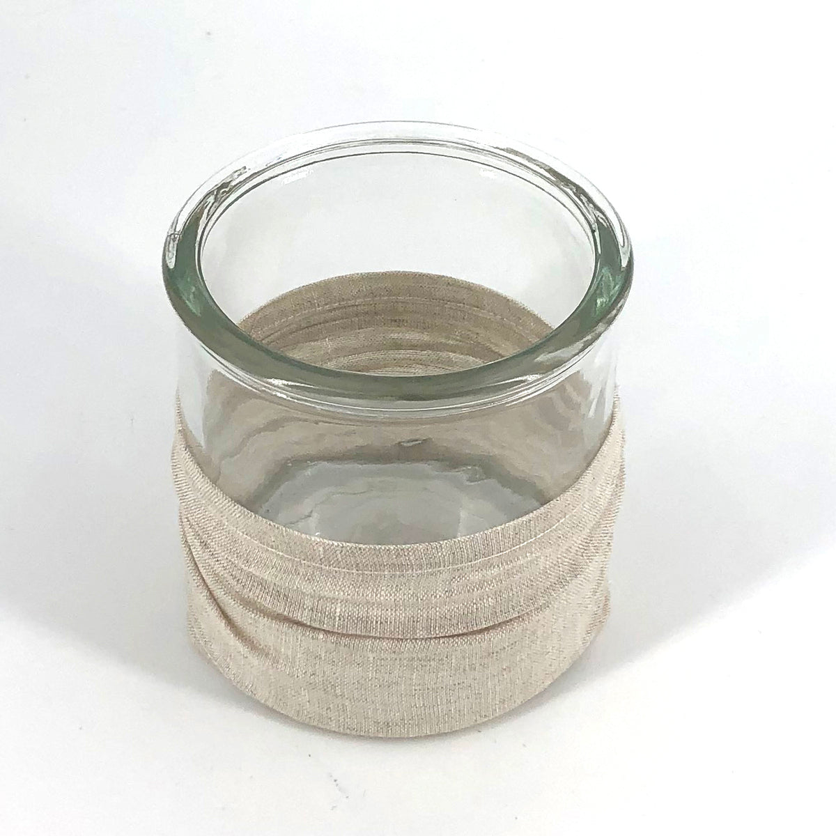 Windlicht aus Glas mit Stoffbezug natur sand