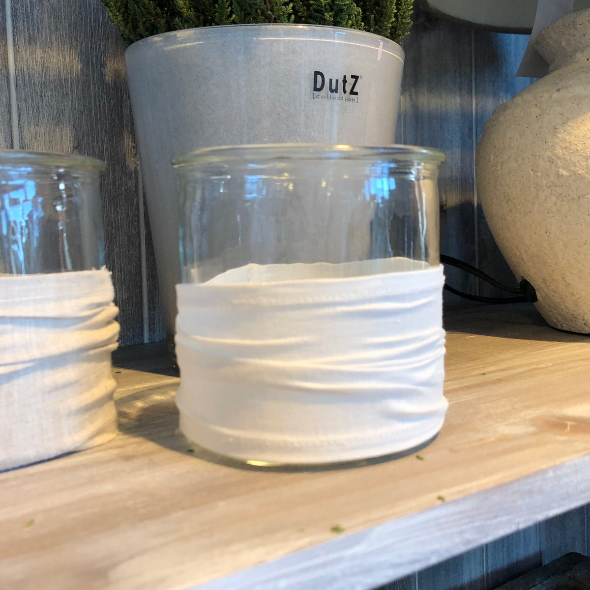 Windlicht aus Glas, mit Stoffbezug