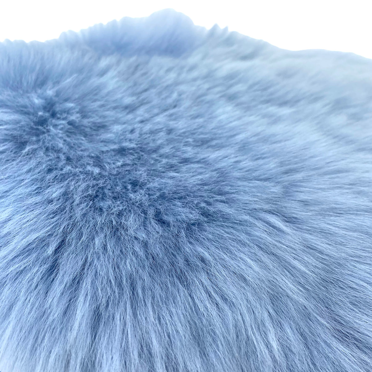 Sitzauflage Lammfell himmelblau blau
